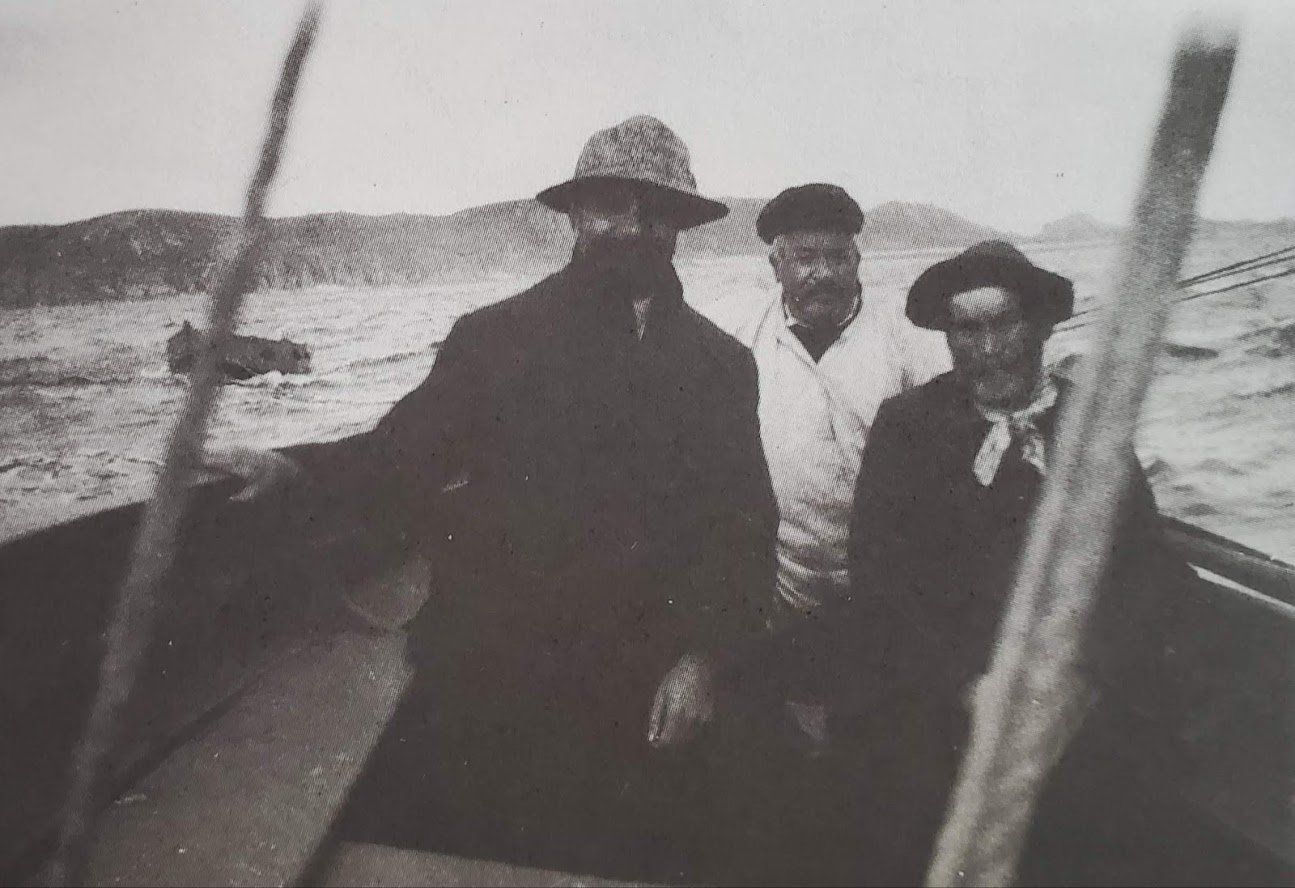 three men on a boat